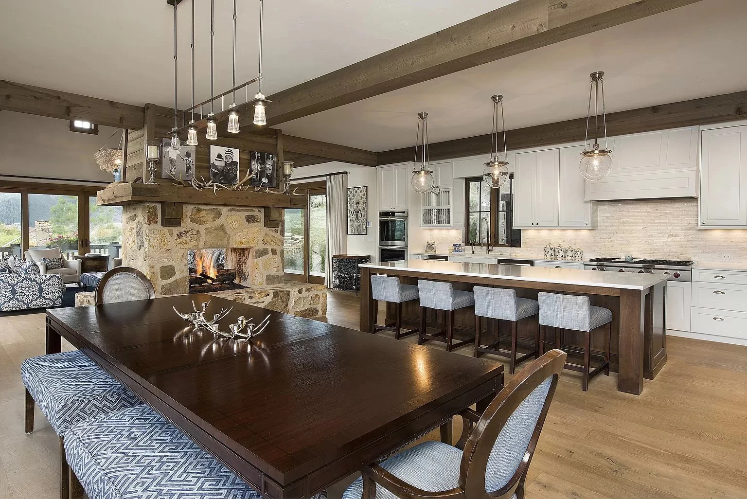 Kitchen and dining room with wood cabinetry